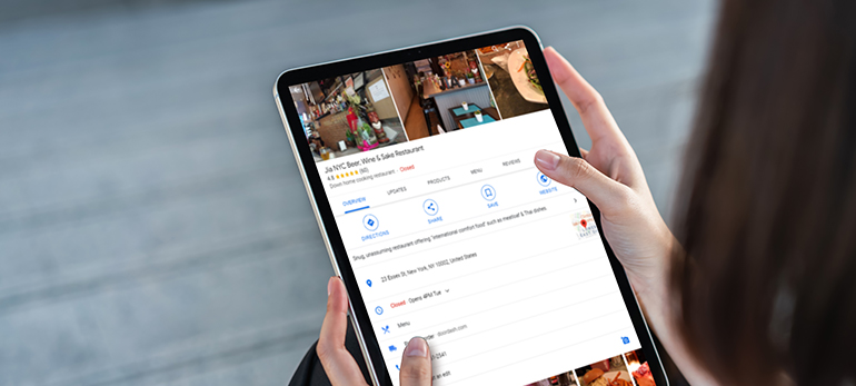 Woman holding a tablet