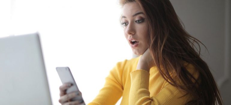 Woman looking at her phone.