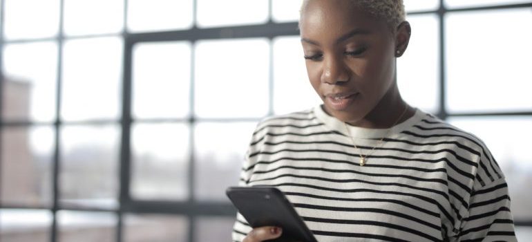 A person exploring the services of a company that uses paid social media advertising