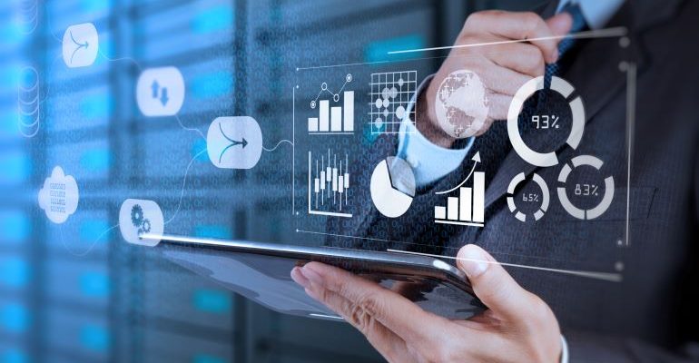 Businessman looking at virtual metrics