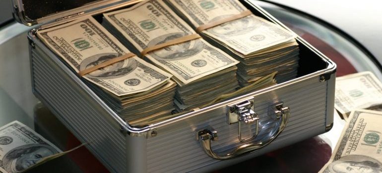 A metal briefcase full of US dollars.