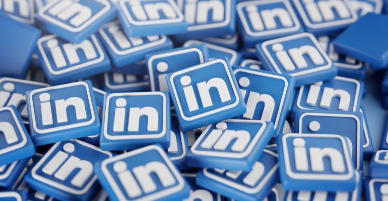 A stack of plastic LinkedIn icons