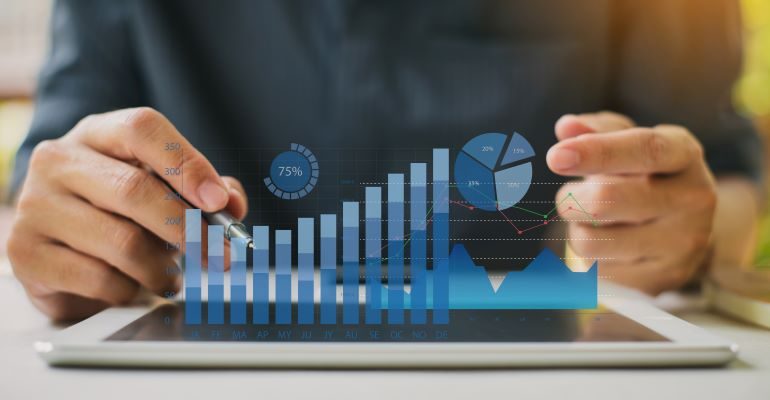 Digital growth chart above a tablet