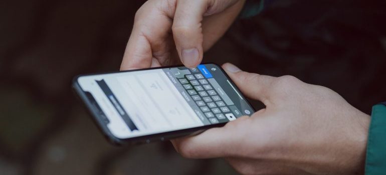 a person using a mobile phone device