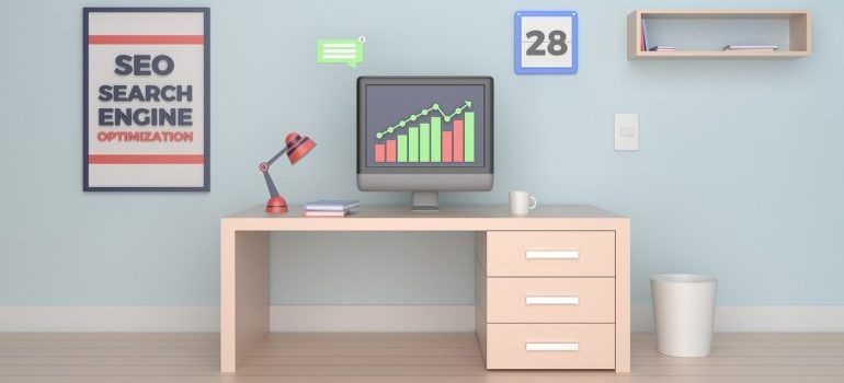 an image of a desktop computer with the words search engine optimization written next to it