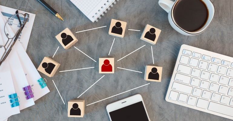 Illustrastion of outreach in link building with dice connected by fake lines.