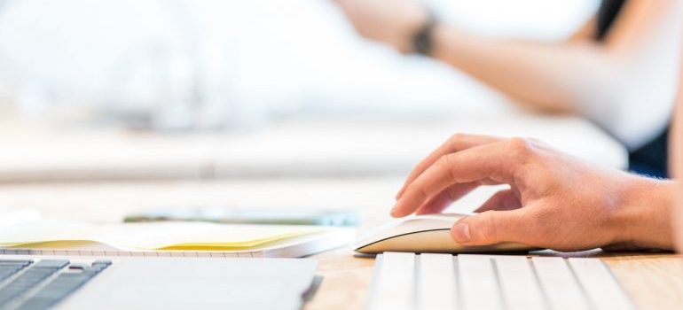 a person using a computer mouse