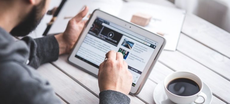 Person browsing articles on how to rank your business in Google Discover.