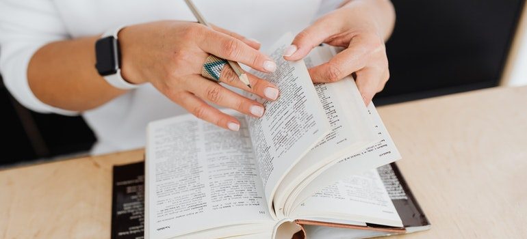Person using a dictionary.