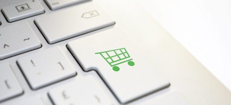 Shopping cart for online sales on keyboard button.