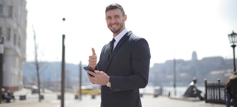 Happy customer giving thumbs up.