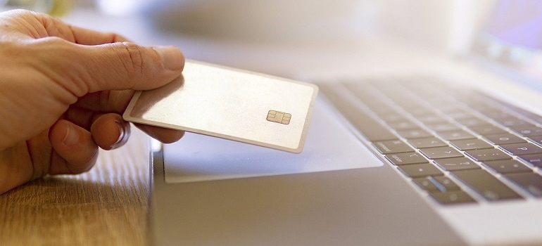 Customer making online purchase with credit card.