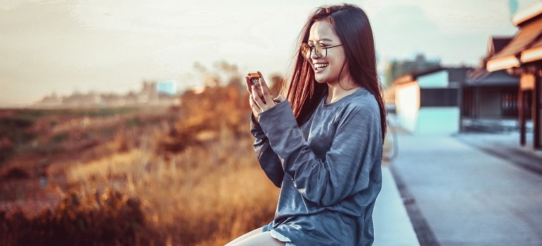 User looking at content on smartphone.