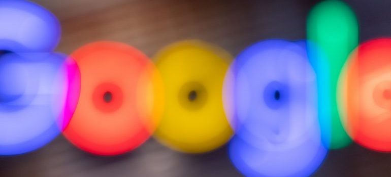 A blurred image of a Google logo.