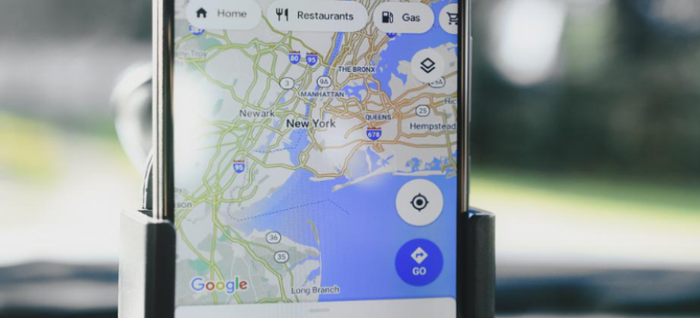 A close-up of a smartphone displaying a Google Maps search.