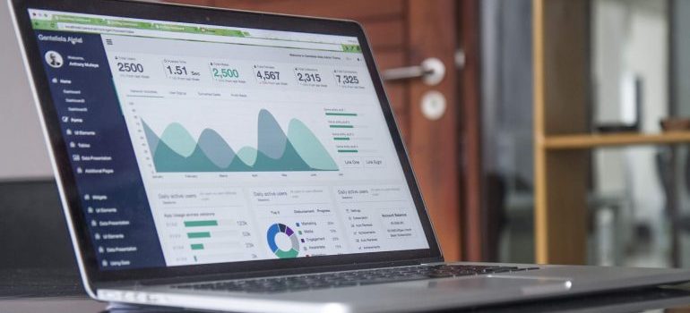 A laptop that displays website statistics.