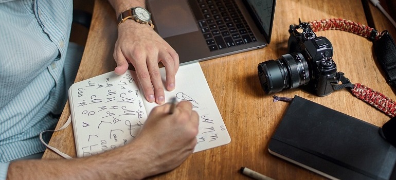 Man testing fonts for rebranding his business.