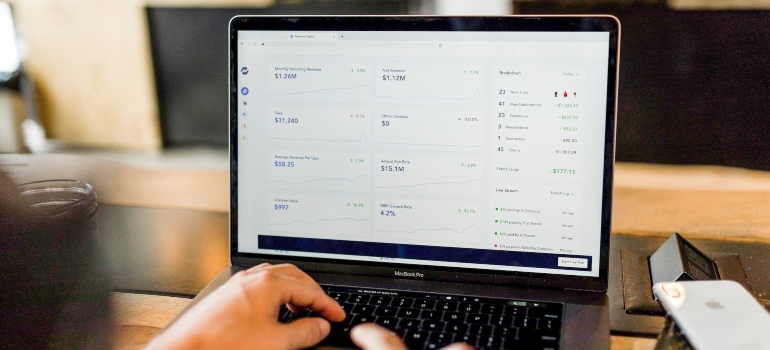 Person using a laptop with website metrics opened on it