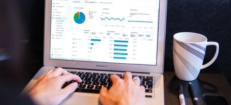 Photo of a laptop with Google Ads statistics on it