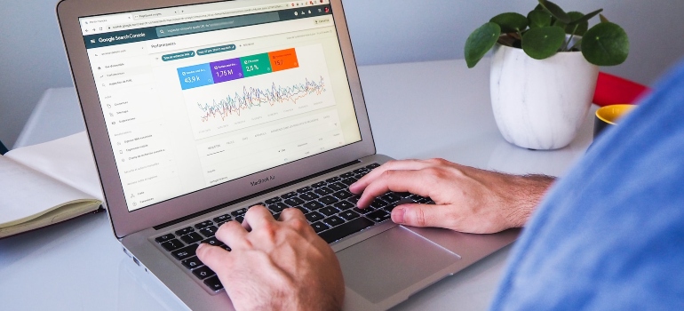 Person using Google Analytics on their laptop
