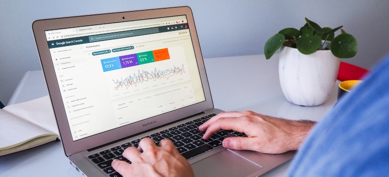 Person using Google Analytics on their laptop