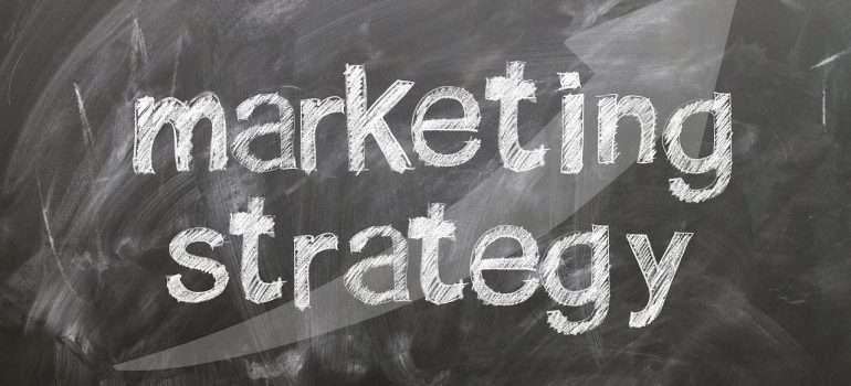 Marketing strategy written on a blackboard.