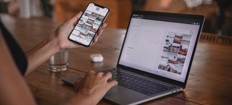 Person using social media on their laptop and their phone