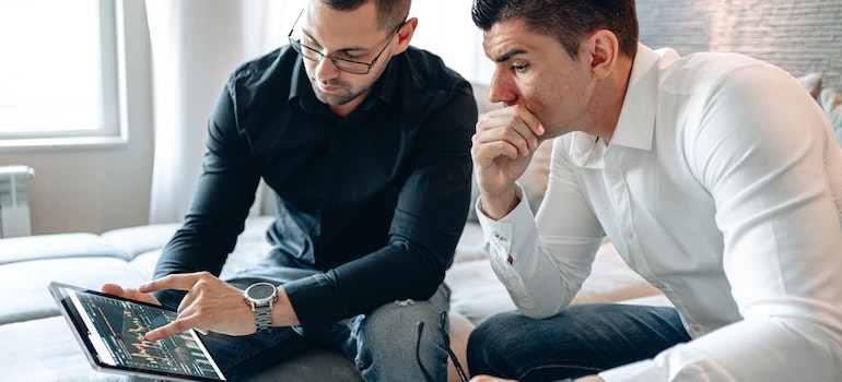 Two men talking.