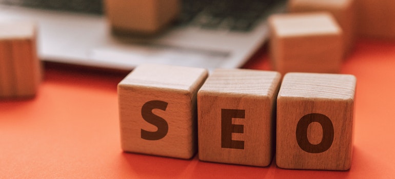 SEO written on wooden cubes as search engine optimization is trending in digital marketing