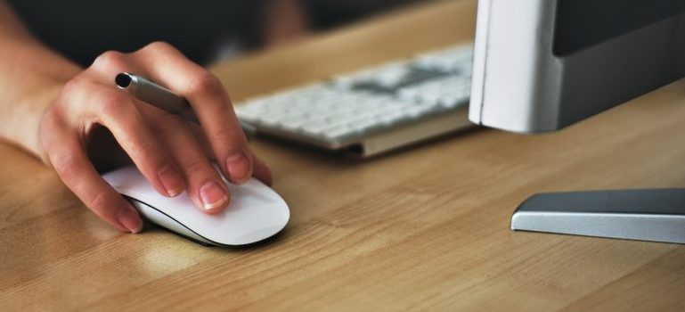 woman clicking on mouse