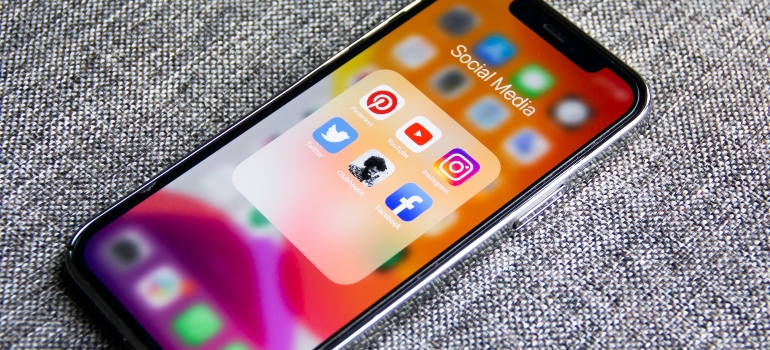 iPhone with social media apps on it