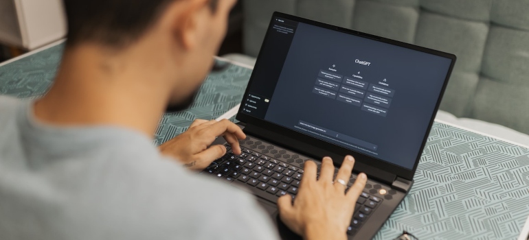 Person using Chat GPT on their laptop