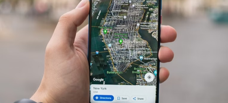 A person using Google Maps, illustrating how the dos and don'ts of alcohol rehab advertising must account for local search.