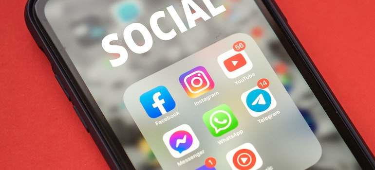 Social media app icons on a smartphone