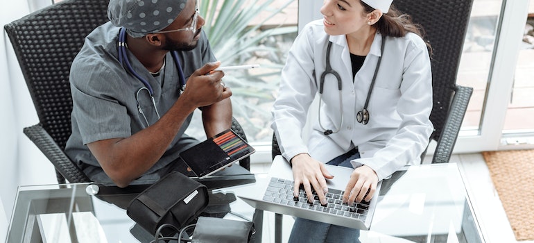 Two health professionals having a conversation