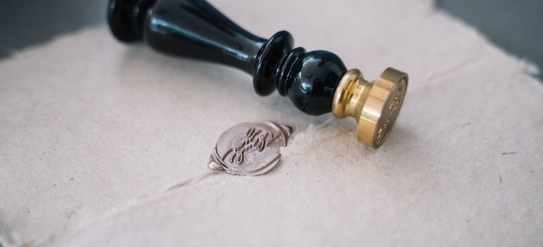 Seal on a paper meaning the importance of certification when it comes to Google and rehab ads.