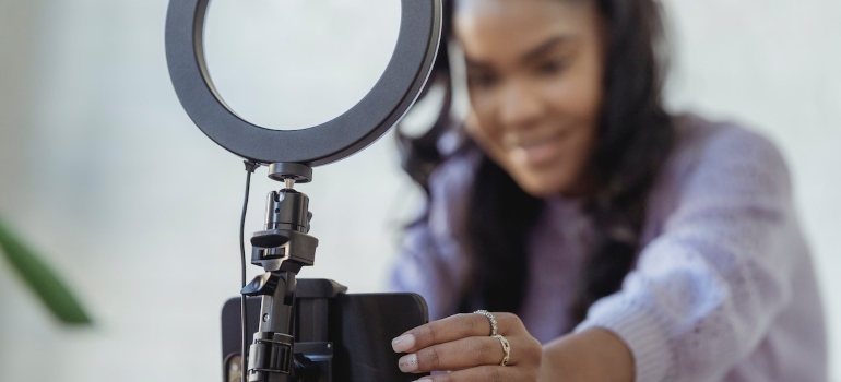 Influencer setting up their devices for recording content