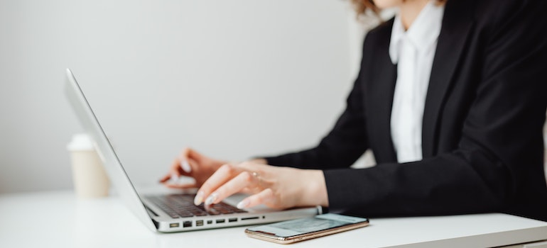 A person a laptop, reading about how content readability affects SEO