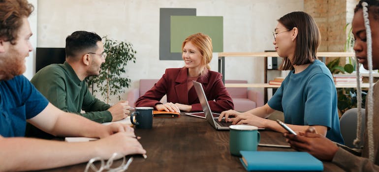 A marketing team having a meeting about the most common mistakes in rehab marketing
