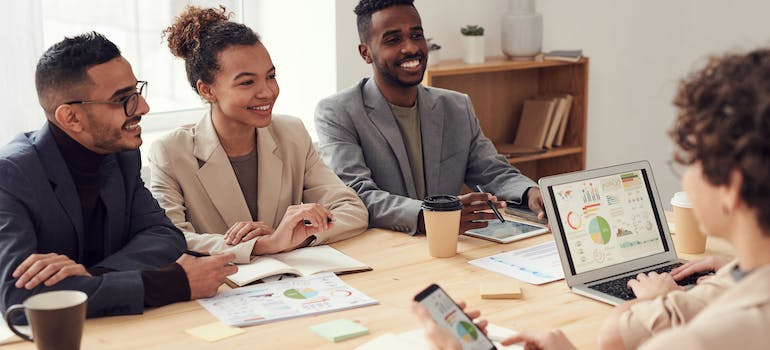 A digital marketing team discussing how customer reviews improve conversions