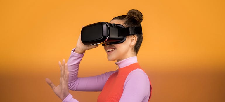 A person using virtual reality goggles, which is one of the 2024 healthcare marketing trends
