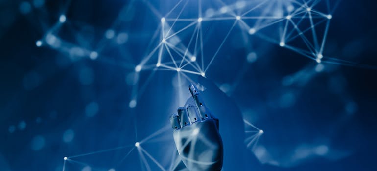 A robot hand and blue lights, representing artificial intelligence