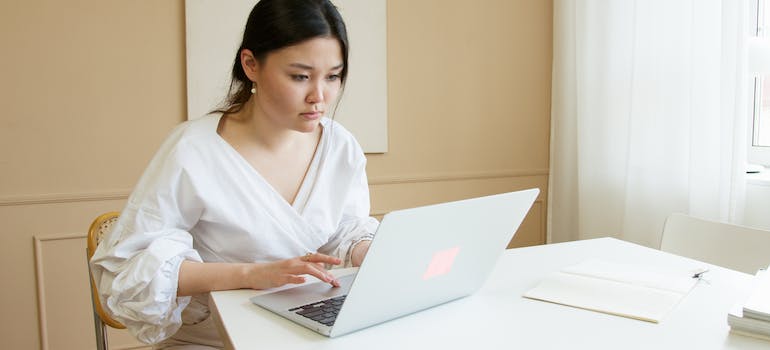 A person reading about strategies for creating an email list to market your rehab center