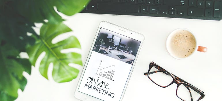 a phone with words online marketing on the display