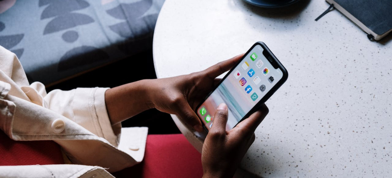 a person scrolling social media on a phone