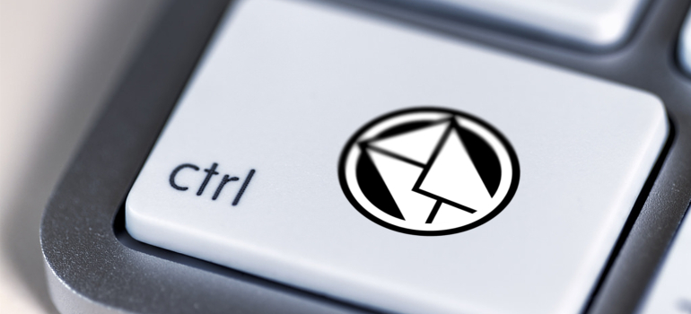 A close-up of a keyboard with a control key and an email icon, symbolizing effective email marketing strategies for law firms.