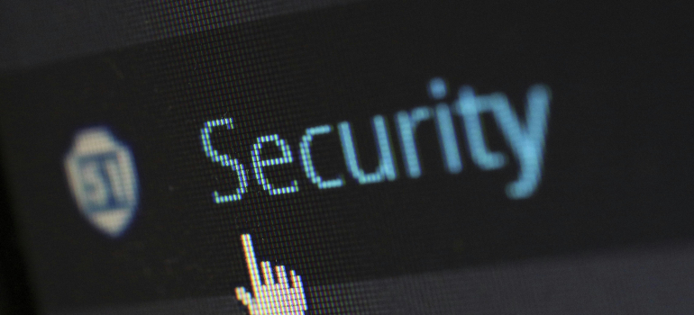 A mouse cursor pointing to words saying "Security"