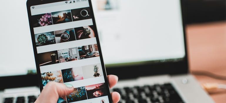 a person scrolling through images on Instagram