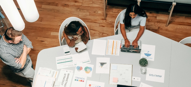 People in an office talking about questions to ask an SEO agency