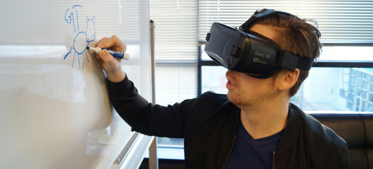 a man with VR glasses